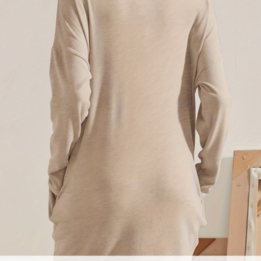 Oatmeal colored sweater dress with pockets